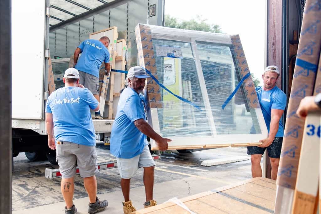 Hometown Contractors install team unloading windows