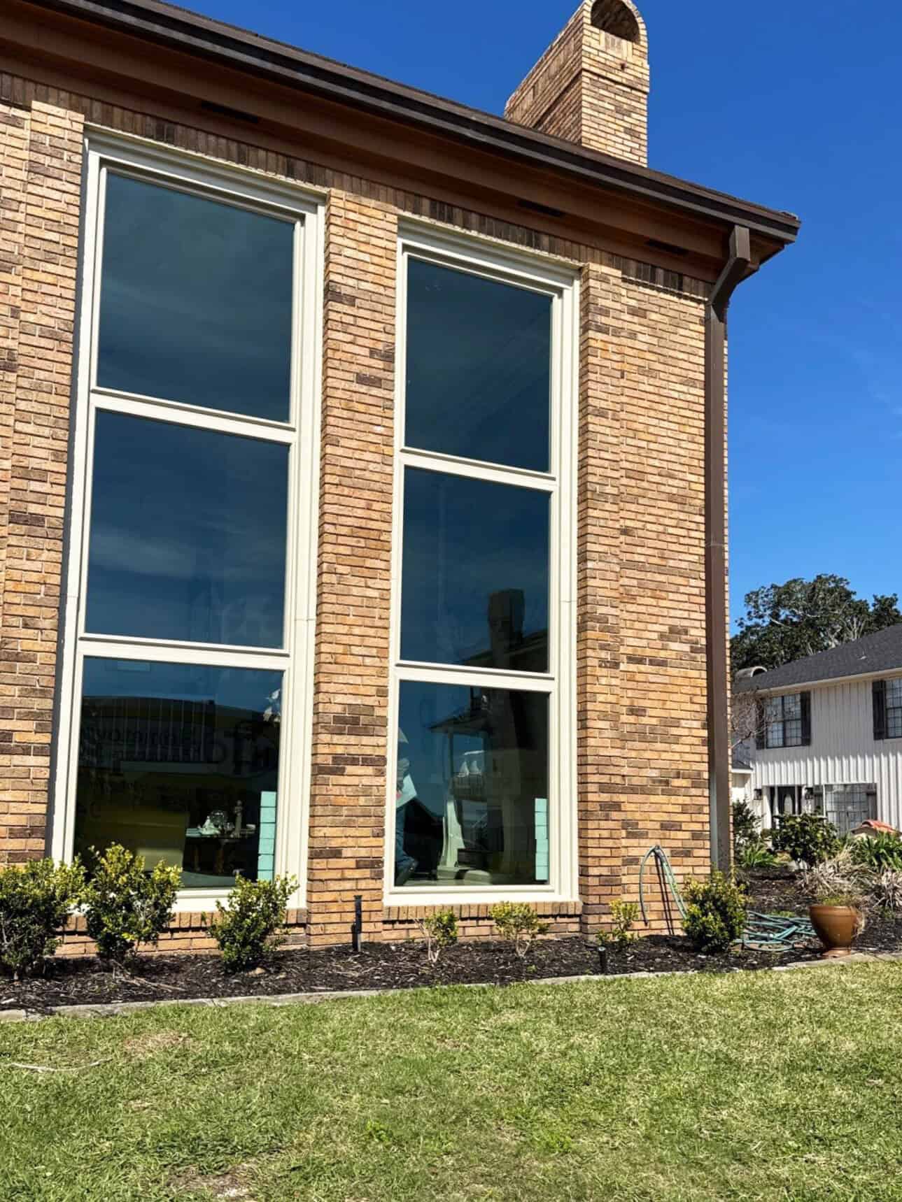 tow story building with two rows of picture windows