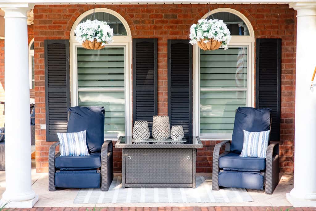 front porch with two round top picture windows