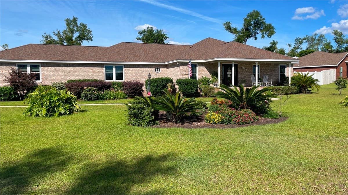 Picture Windows 2 red brick home with picture windows