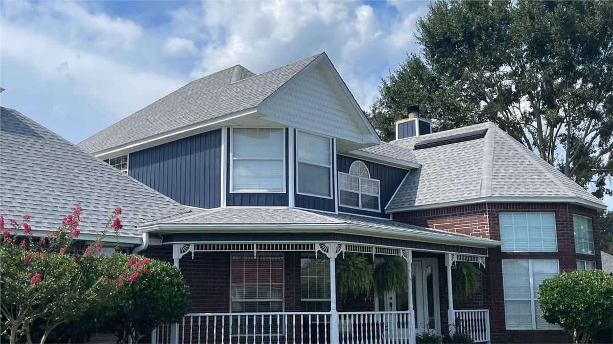 siding17 red brick and navy vertical composite siding