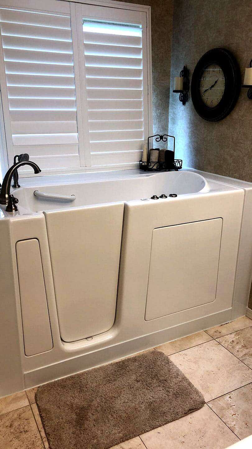 walkintub3 new walk-in tub with black faucet and fixtures
