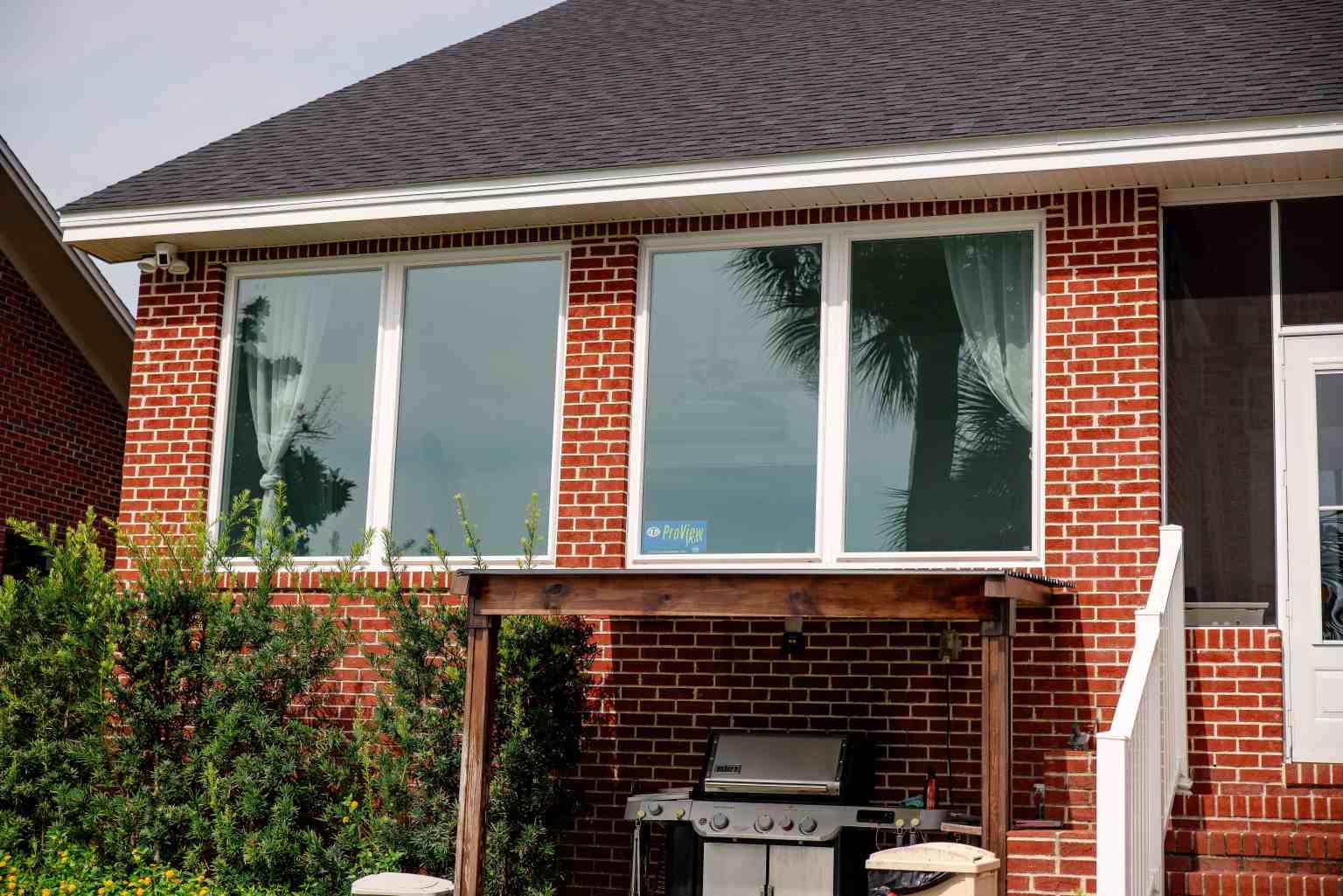 LatashaCarrawayPhotography-5348 red brick home with picture windows