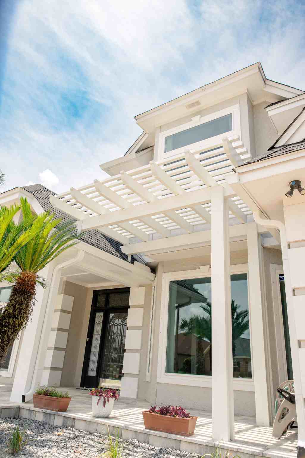 LatashaCarrawayPhotography-5575copy home exterior with white classic pergola and picture window
