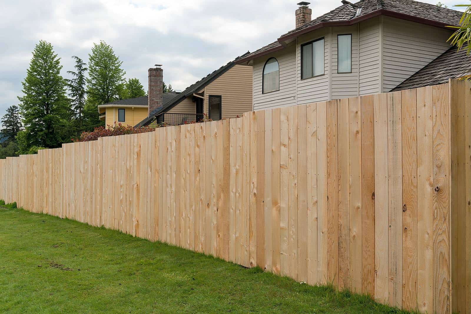 new wooden exterior privacy fence