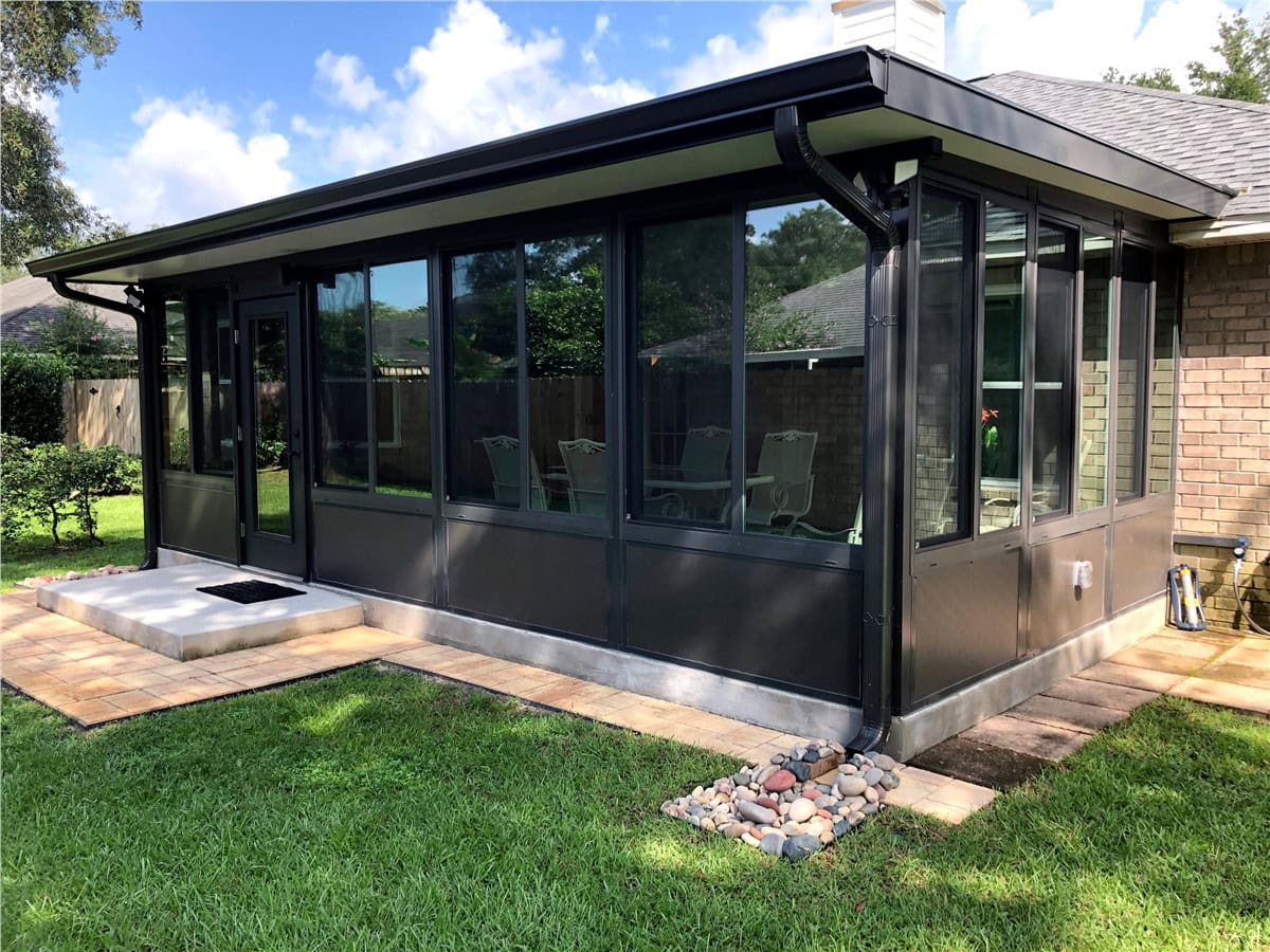2e481a32-e507-4e6d-9909-01669934eb4f Dark brown sunroom installed in Pace, FL by HTC Pros