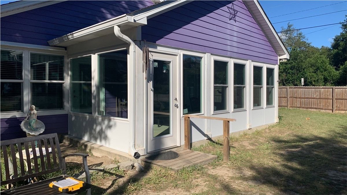 9f0e50f9-0c2b-4099-8da0-b1556631cd58 Beige porch to sunroom conversion built by Hometown Contractors