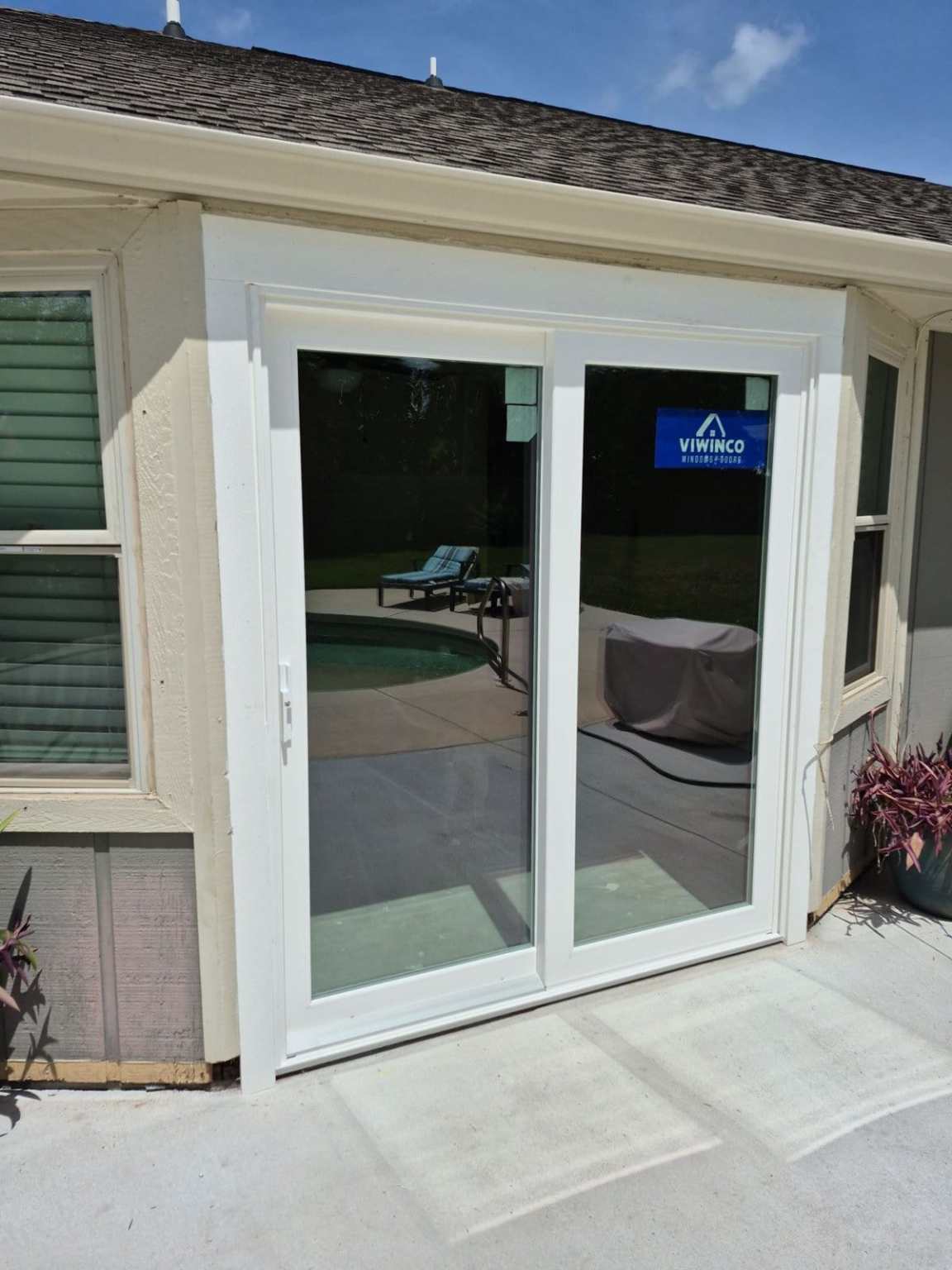 Marrelo, Michael Brand new all white ViWinco sliding glass patio doors installed by award-winning home improvement experts HTC Pros (Hometown Contractors, Inc)