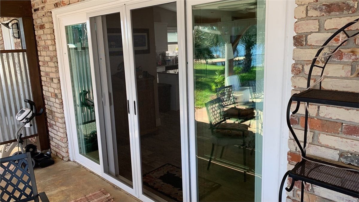 Sliding Patio Doors 1 Close-up of newly installed sliding glass patio doors installed by award-winning home improvement specialists Hometown Contractors, Inc.