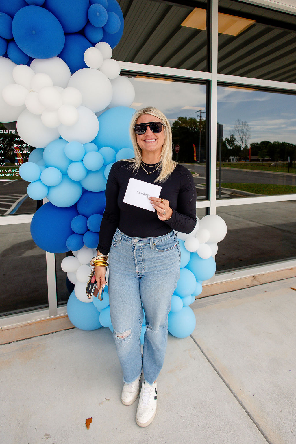 Door prize winner at Hometown Contractors showroom grand opening event