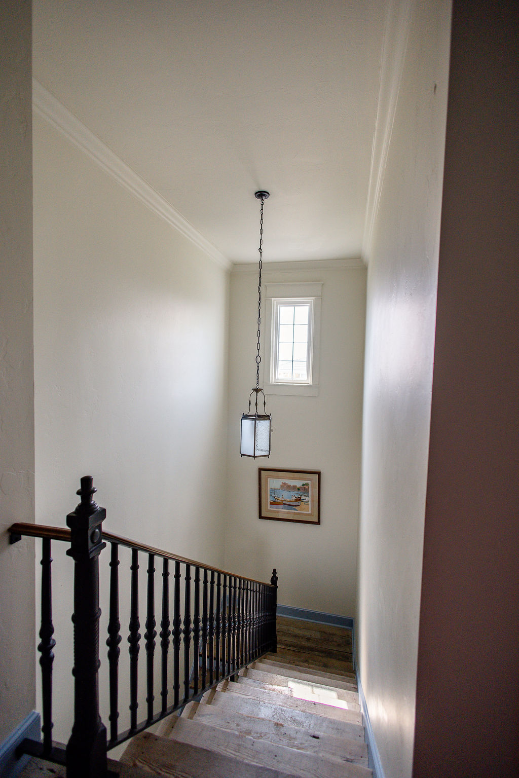 LatashaCarrawayPhotographyKlaritchAfters-8356 Custom window over stairwell, installed by Hometown Contractors