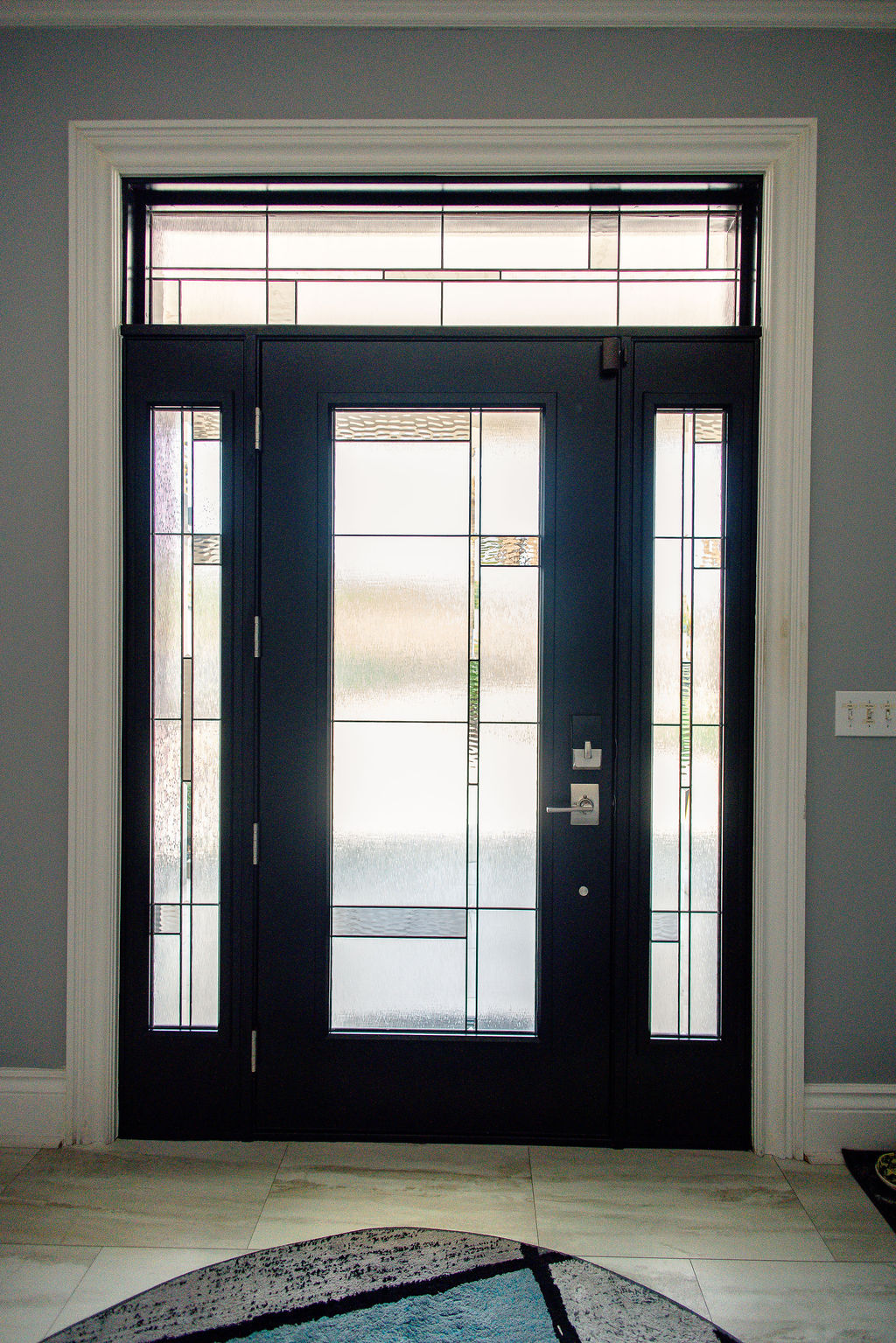 LatashaCarrawayPhotographyReynoldsAfters-8120 Front entry door interior installed by HTC Pros.