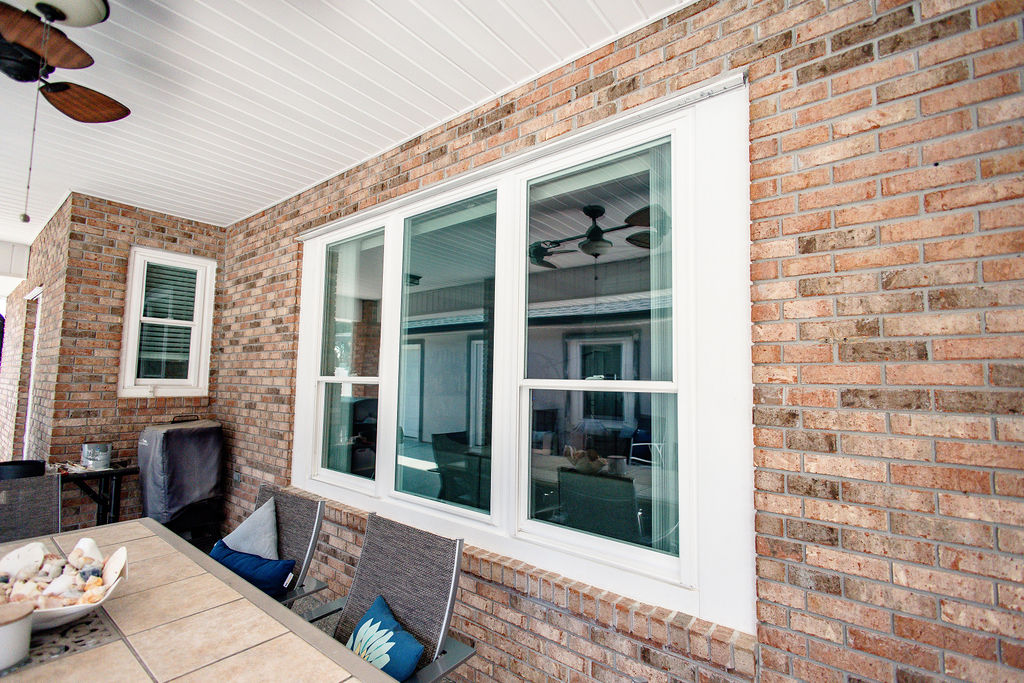LatashaCarrawayPhotographyReynoldsAfters-8152 Specialty windows as installed by Hometown Contractors Inc