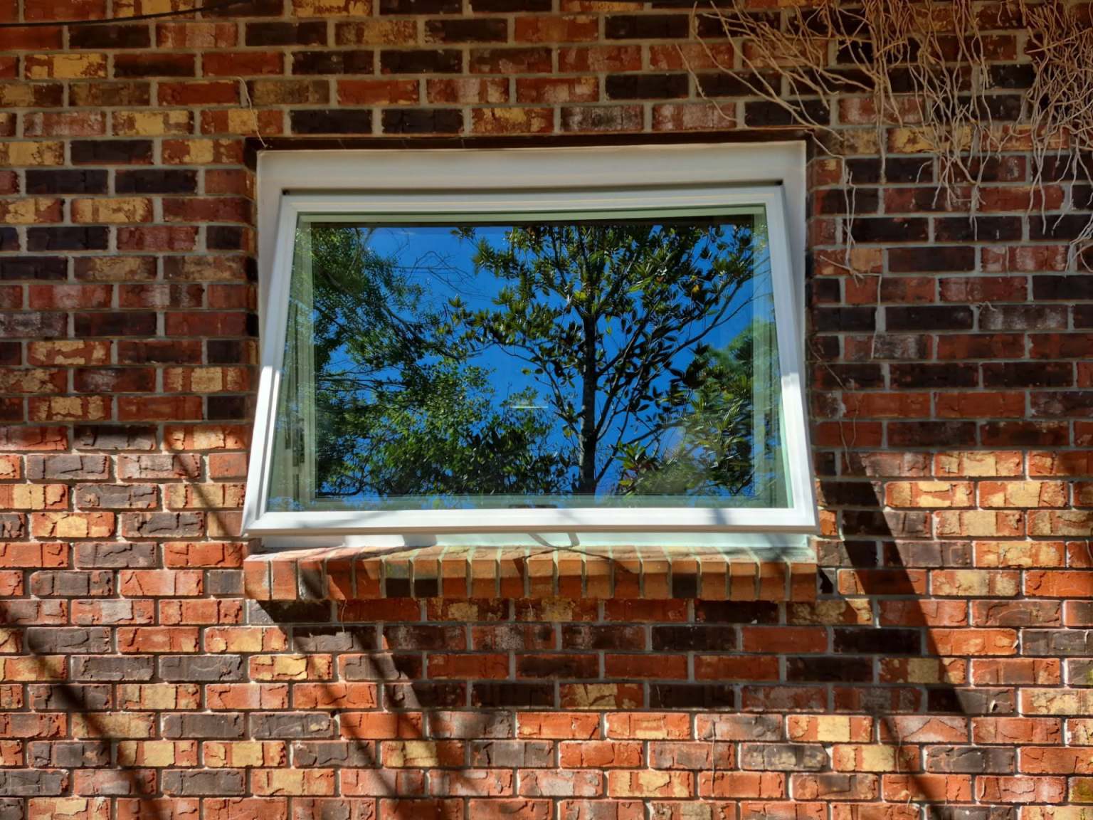 Gallery Awning Window1 Photo of awning window on red brick home