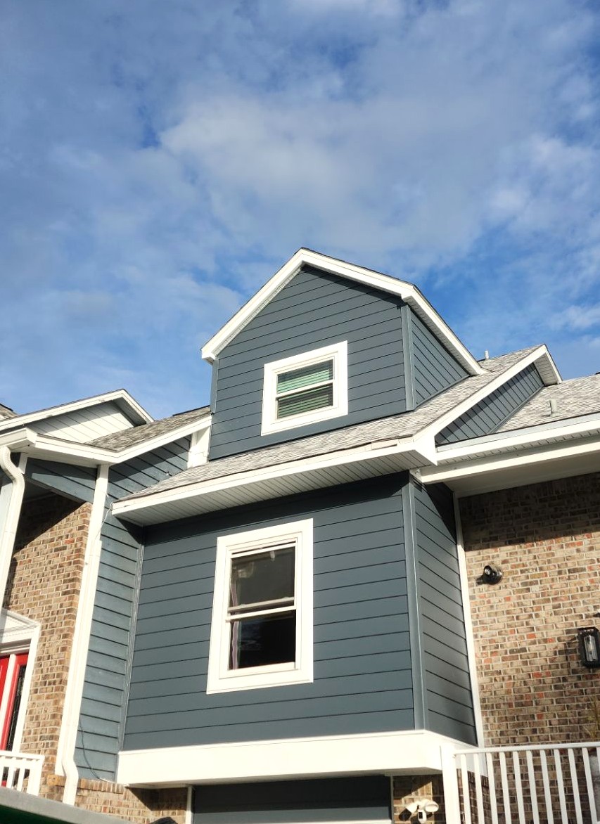 Gallery Gray Blue Siding Gray blue composite siding on the front of a home