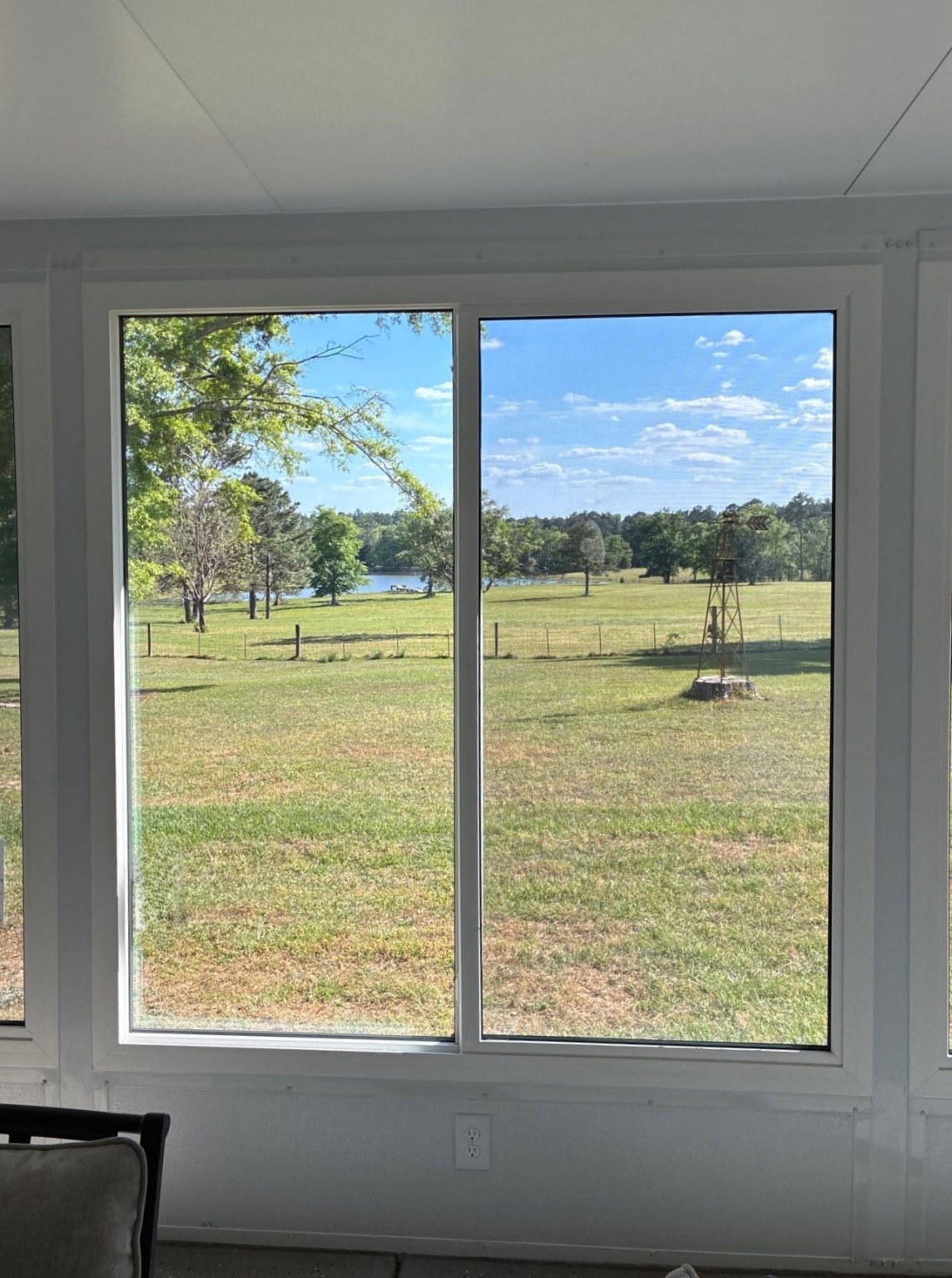 Gallery Sliding Window Sliding window with a backyard view
