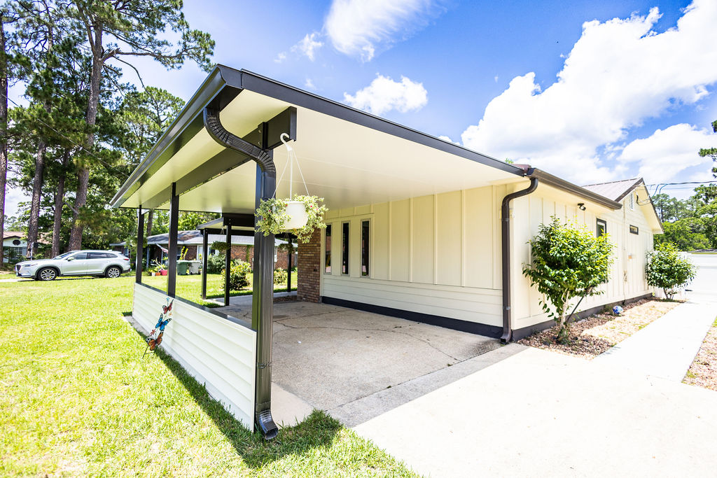 LatashaCarrawayPhotography.-3673 home exterior with new siding, carport, and patio cover