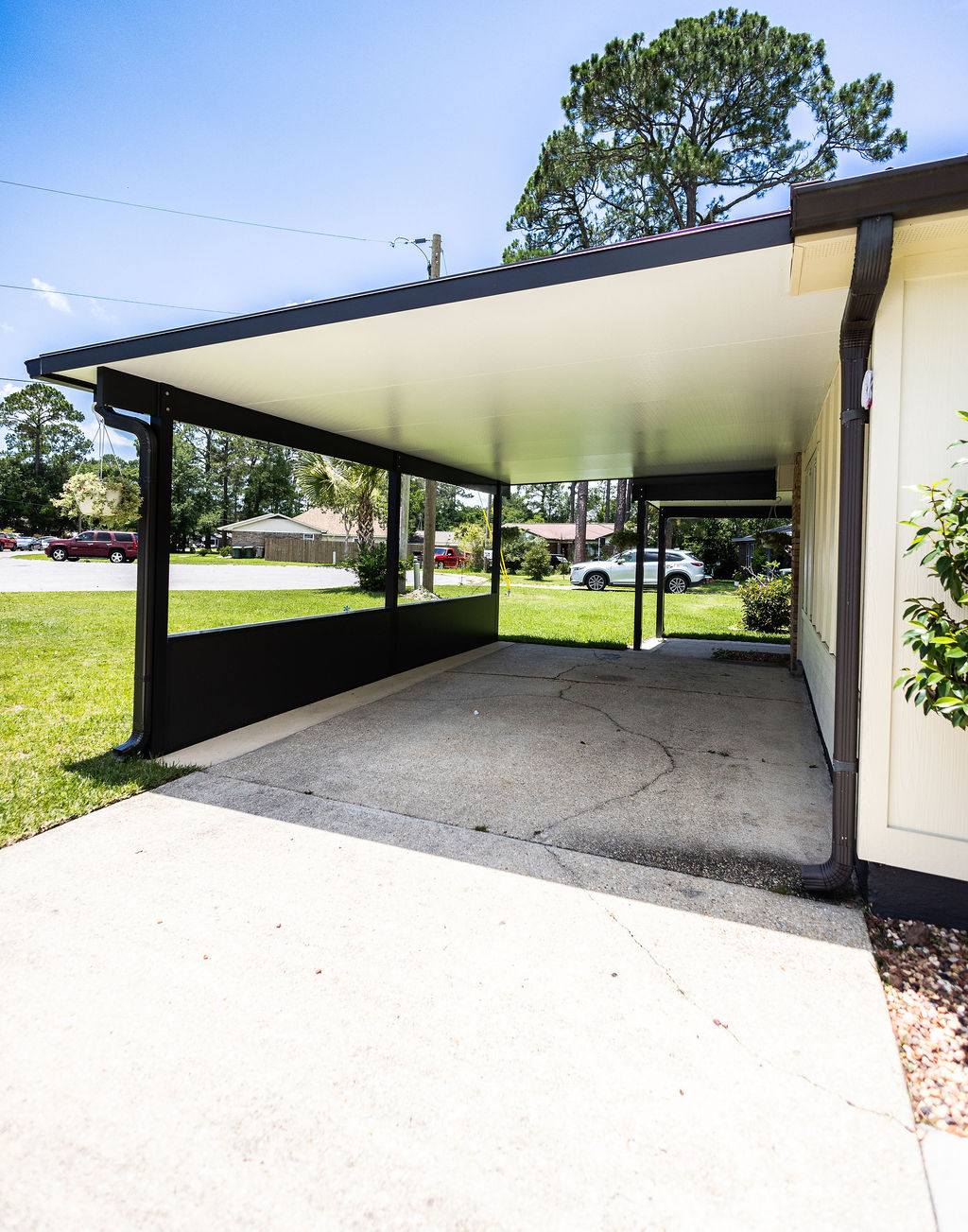 LatashaCarrawayPhotography.-3684 home exterior with new siding, carport, and patio cover