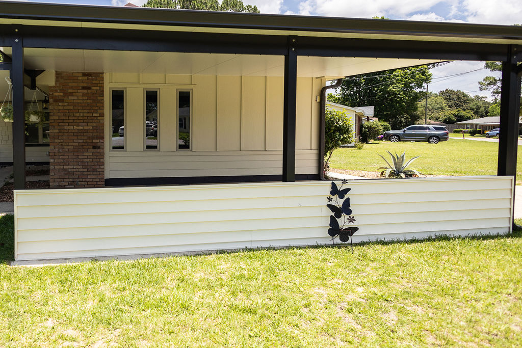 LatashaCarrawayPhotography.-3696 home exterior with new siding, carport, and patio cover