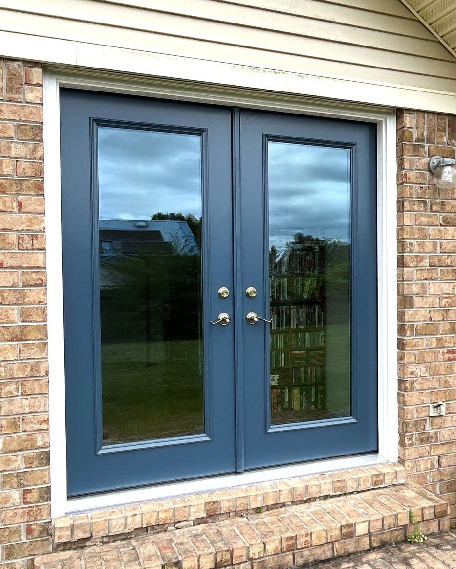 Gallery Dark Blue French Doors Blue French patio doors with white trim and silver handles