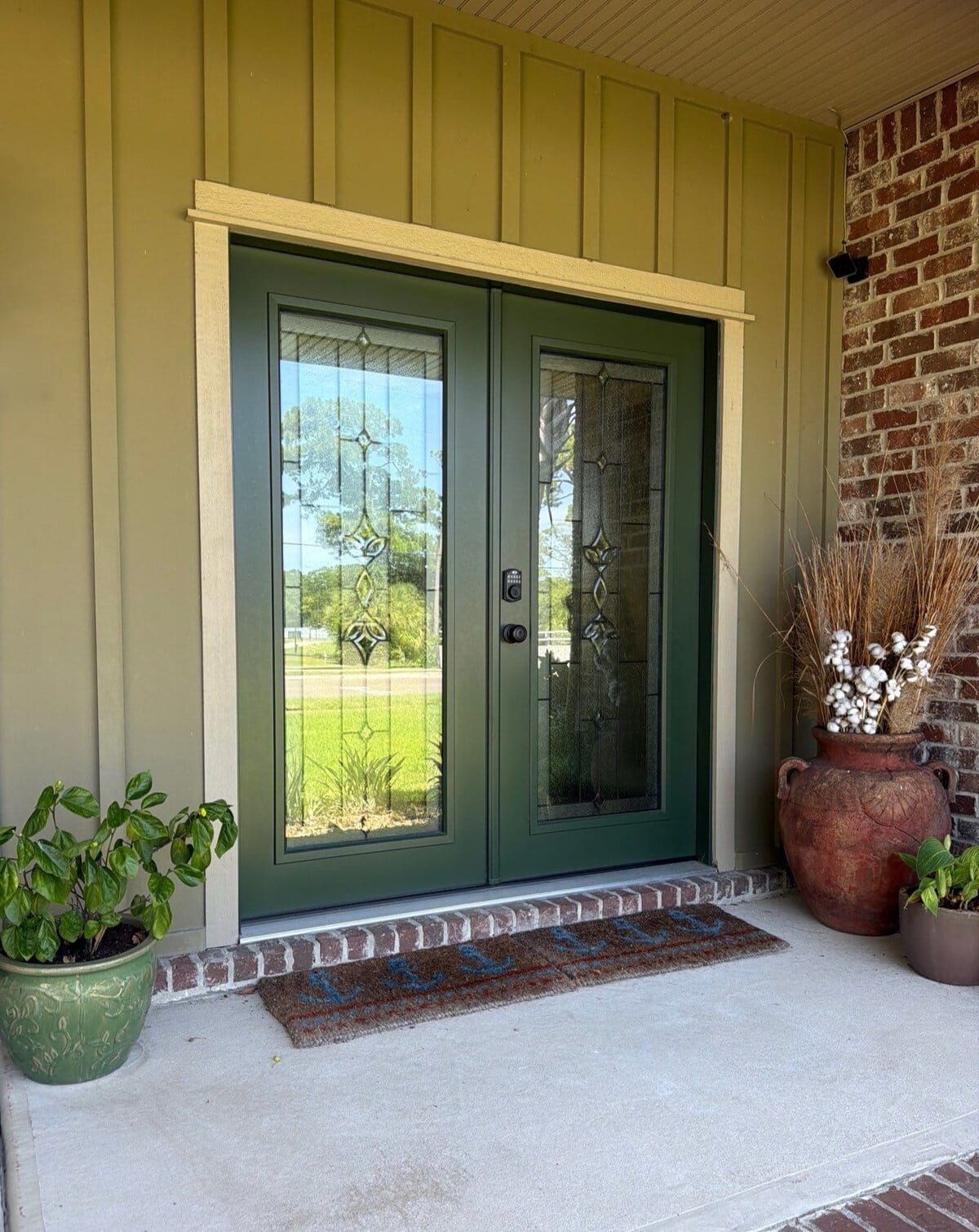 Gallery Dark Green Front Entry Doors Dark green front entry doors with decorative windows and a black doorknob