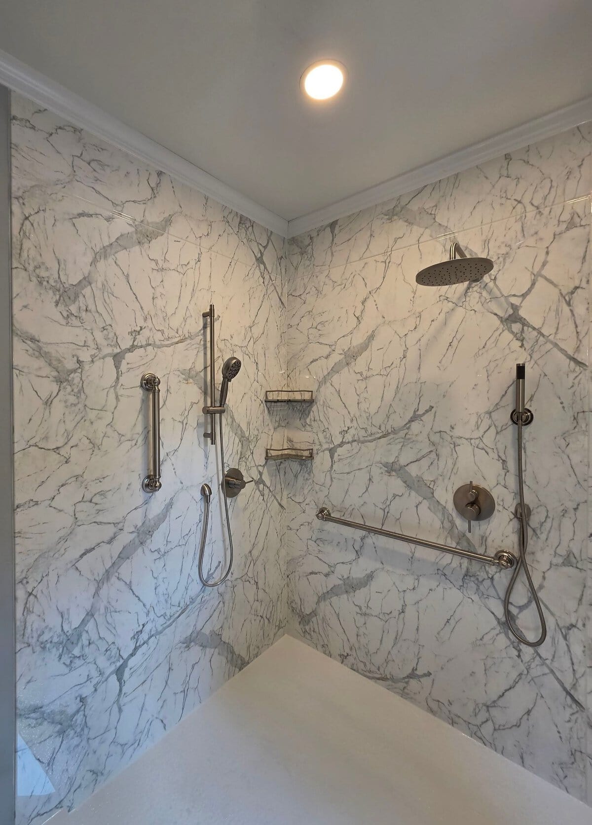 Gallery Large Walk In Shower1 Marble-like shower wall surrounds with silver hardware and a horizontal silver grab bar
