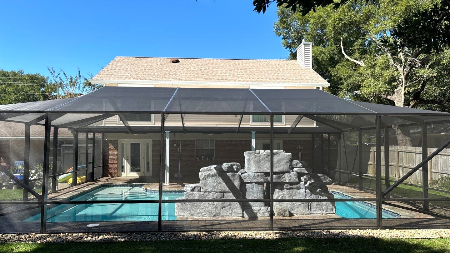 Gallery Pool Screen Enclosure Screen pool enclosure from the outside with a rock decoration inside near the pool