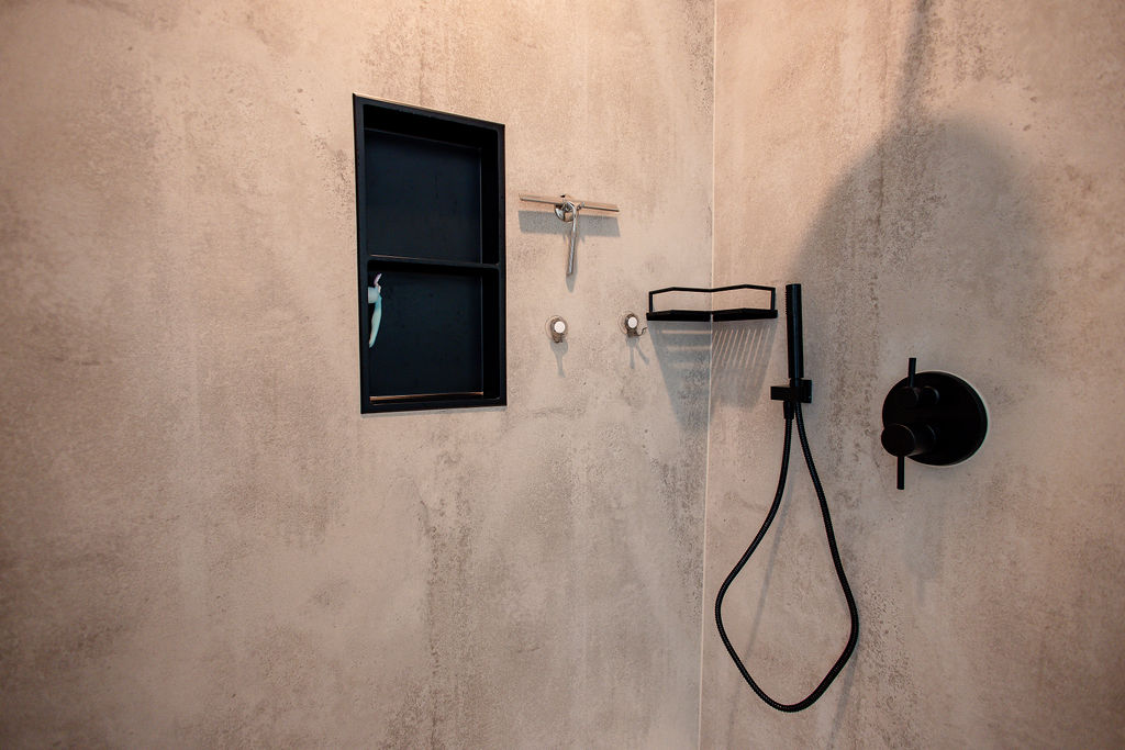 LatashaCarrawayPhotographyO’BRIEN-1326 Walk-in shower with storage niche, corner shelving, and detachable wand